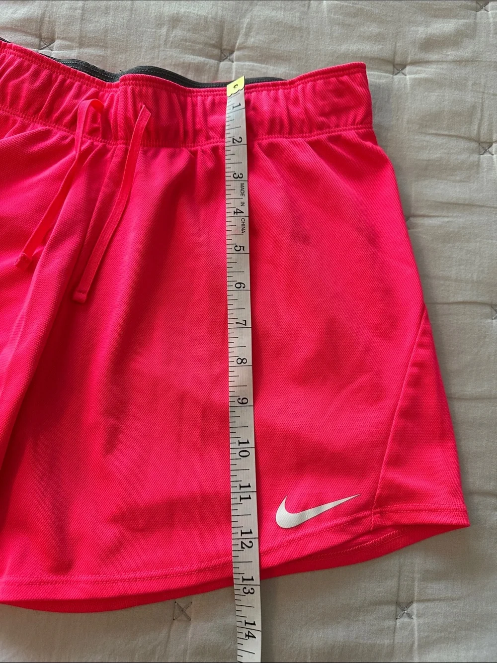 Nike Women's Neon Pink Athletic Shorts with Swoosh